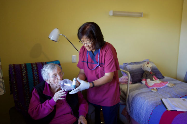 Jamie assisting Phyllis with a puffer and spacer