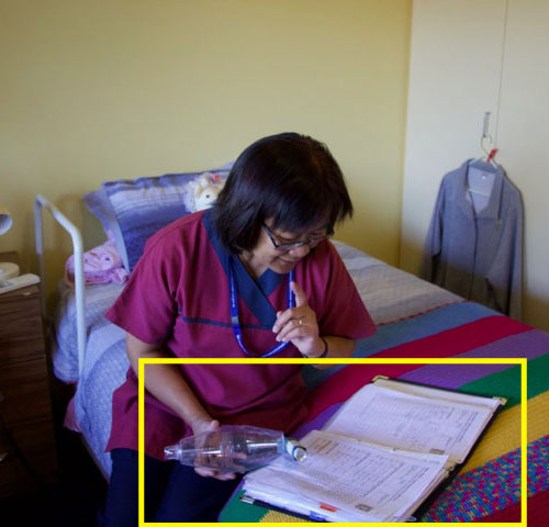 Jamie checking the medication