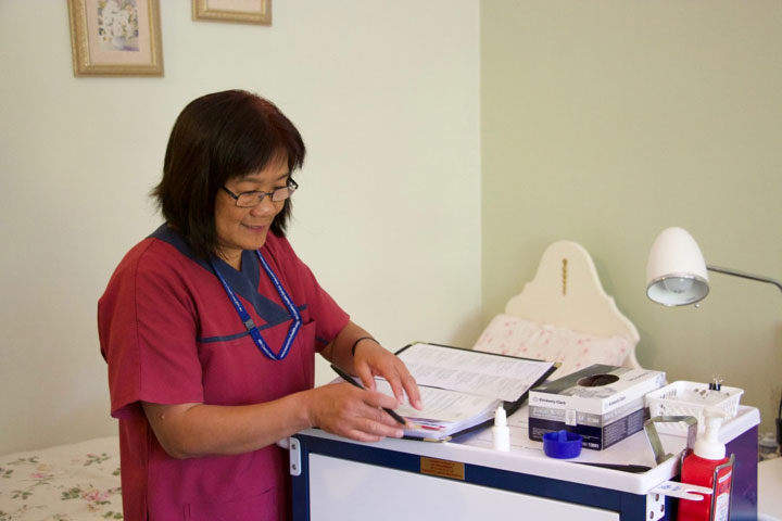 Jamie signing the documentation